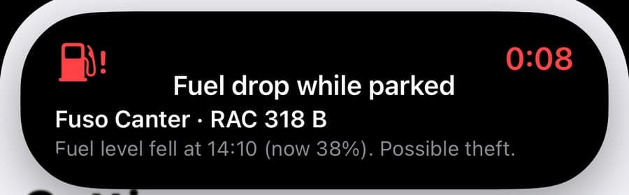 Dynamic Island alert: fuel drop while parked